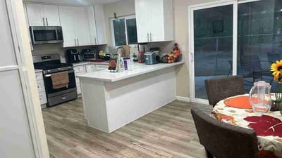 Bright interior kitchen with modern appliances and decor