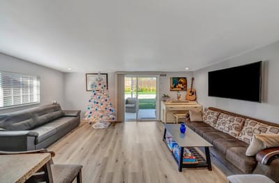 Bright common area with Christmas tree decoration