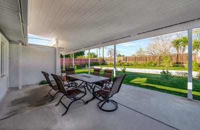 Outdoor seating area with a garden view