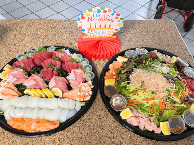 Platter of sushi and salad for a birthday celebration