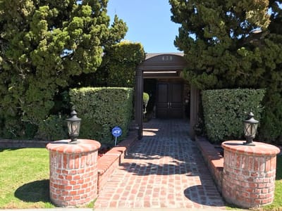 Entrance to Olive Tree Home Care with landscaped path