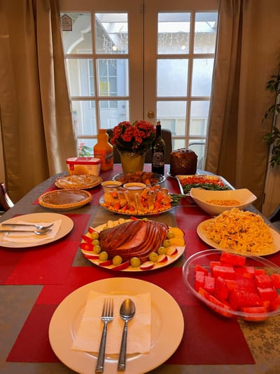 A beautifully set dining table with various foods