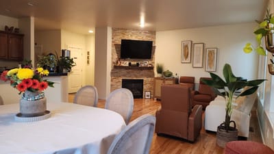 Cozy common area with comfortable seating and plants