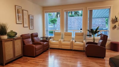 Cozy common area with seating and natural light