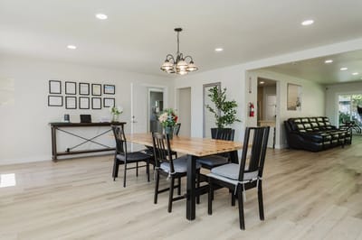 Common area with dining table and chairs