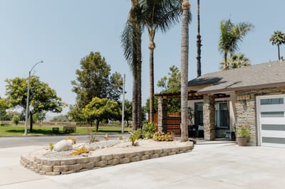 Exterior view of assisted living facility with landscaping