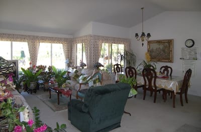 Bright common area with comfortable seating and plants