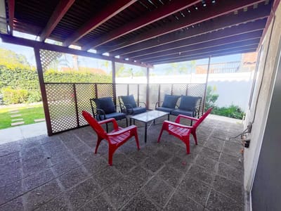 Outdoor seating area with chairs and table