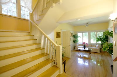 Bright interior lobby with stairs and seating area