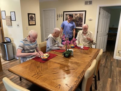 Residents enjoying a meal in the dining area