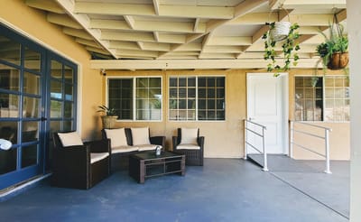 Cozy common area with seating and plants