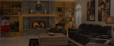 Cozy common area with a fireplace and seating