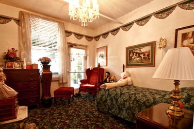Cozy private room with floral decor and soft lighting