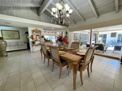 Dining room with wooden table and chandelier