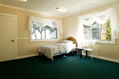 A bright and spacious bedroom in the facility