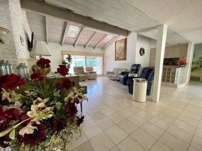Bright common area with comfortable seating and decor