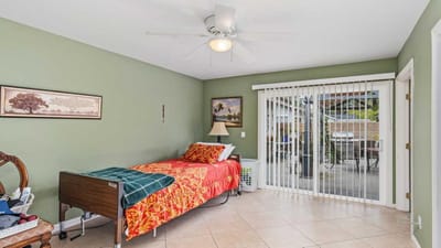 Cozy resident room with sliding door to outdoor area