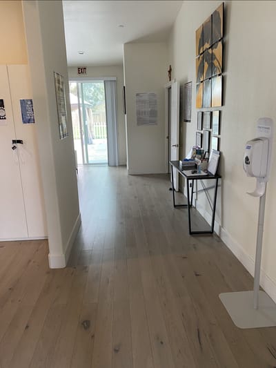 Bright hallway leading to outdoor space