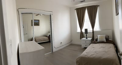 Simple private resident room with light decor