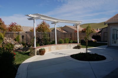 Outdoor patio area with a pergola