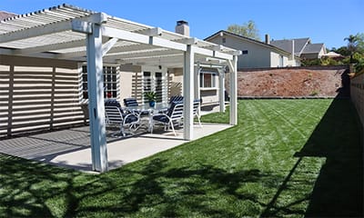 Outdoor patio area with chairs and table