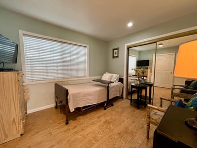 Private resident room with bed and decorations