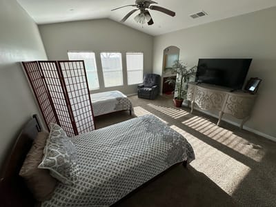Cozy shared bedroom in an assisted living facility