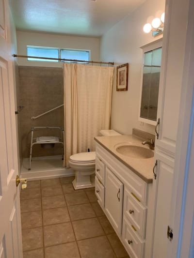 Bathroom with shower and accessible features