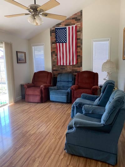 Interior common area with chairs and an American flag