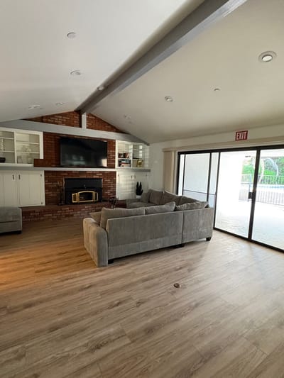 Cozy common area with a sofa and TV