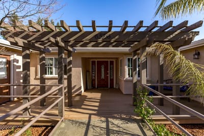 Front entrance of Shearwater Residence with pergola