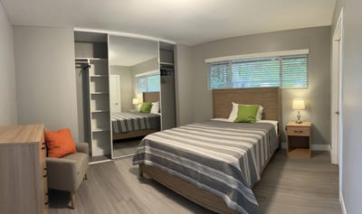 Cozy private room with modern decor and natural light