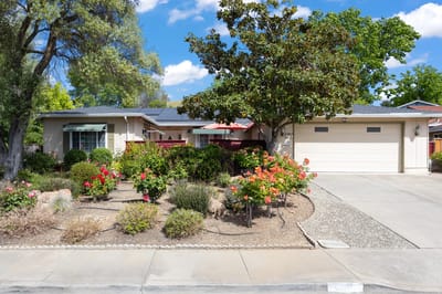 Exterior view of Rock Oak Villa with a garden