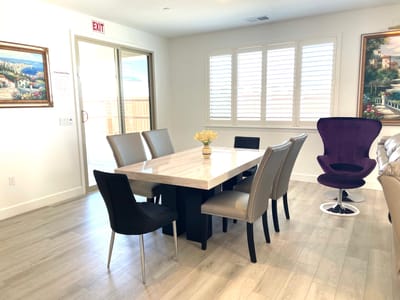 Interior view of a dining room with a large table