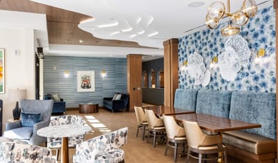 Bright common area with modern furniture and decor
