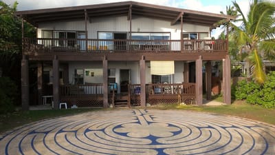 Exterior view of a senior living facility with outdoor space