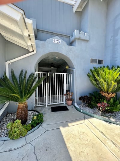 Exterior view of the facility entrance with landscaping
