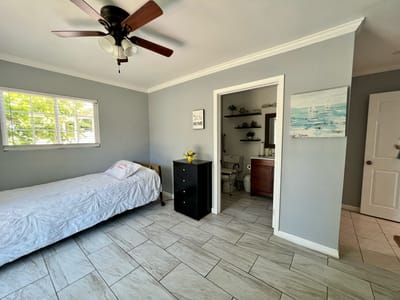 A private resident room with a bed and bathroom