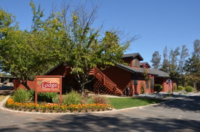 Exterior view of Ramona Senior Lodge with landscaping