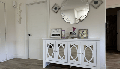Bright, welcoming interior space with a console table