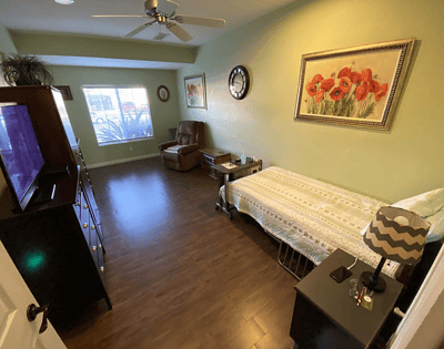 Bright and cozy resident room with comfortable seating