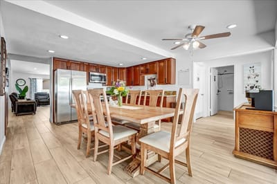 Bright dining area with wooden furniture and decor