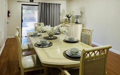 Dining room set up for a meal with elegant decor