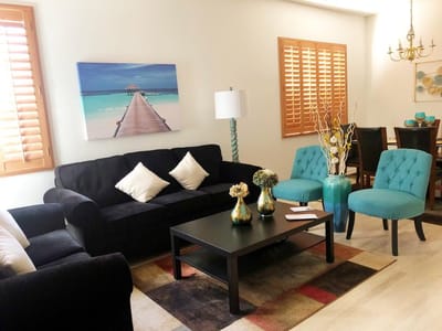 Bright living area with furniture and decor