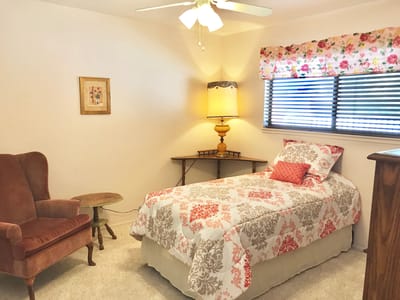 Cozy private bedroom with quaint decor
