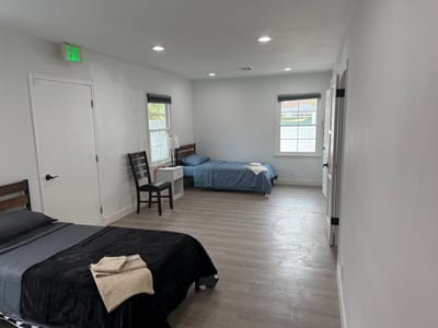 Bright private resident room with two beds