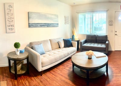 Cozy common area with seating and natural light