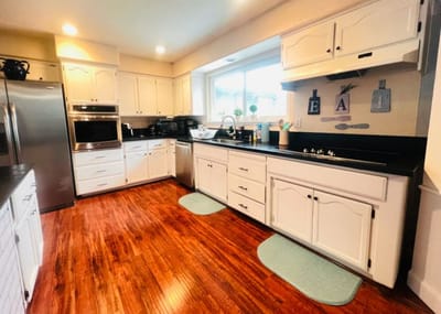 Bright kitchen area with modern appliances