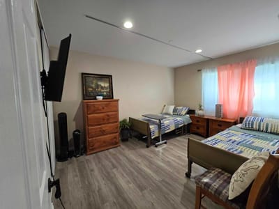 Interior view of a shared resident room with two beds