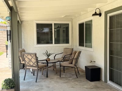 Outdoor seating area with chairs and a table